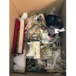 Box full of costume jewellery to include brooches, pearl necklaces, tiaras and various other items