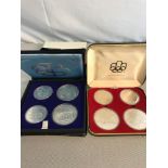 2 Sets of 1976 silver Canadian Olympic coin sets fitted in presentation boxes. comes with cover