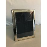 English silver photo frame. measures 21x16cm. Maker Laurence R Watson & Co.