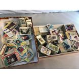 2 Boxes full of collectable cigarette cards and football cards