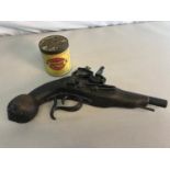 Replica Flintlock pistol & Vintage Goldflake tin
