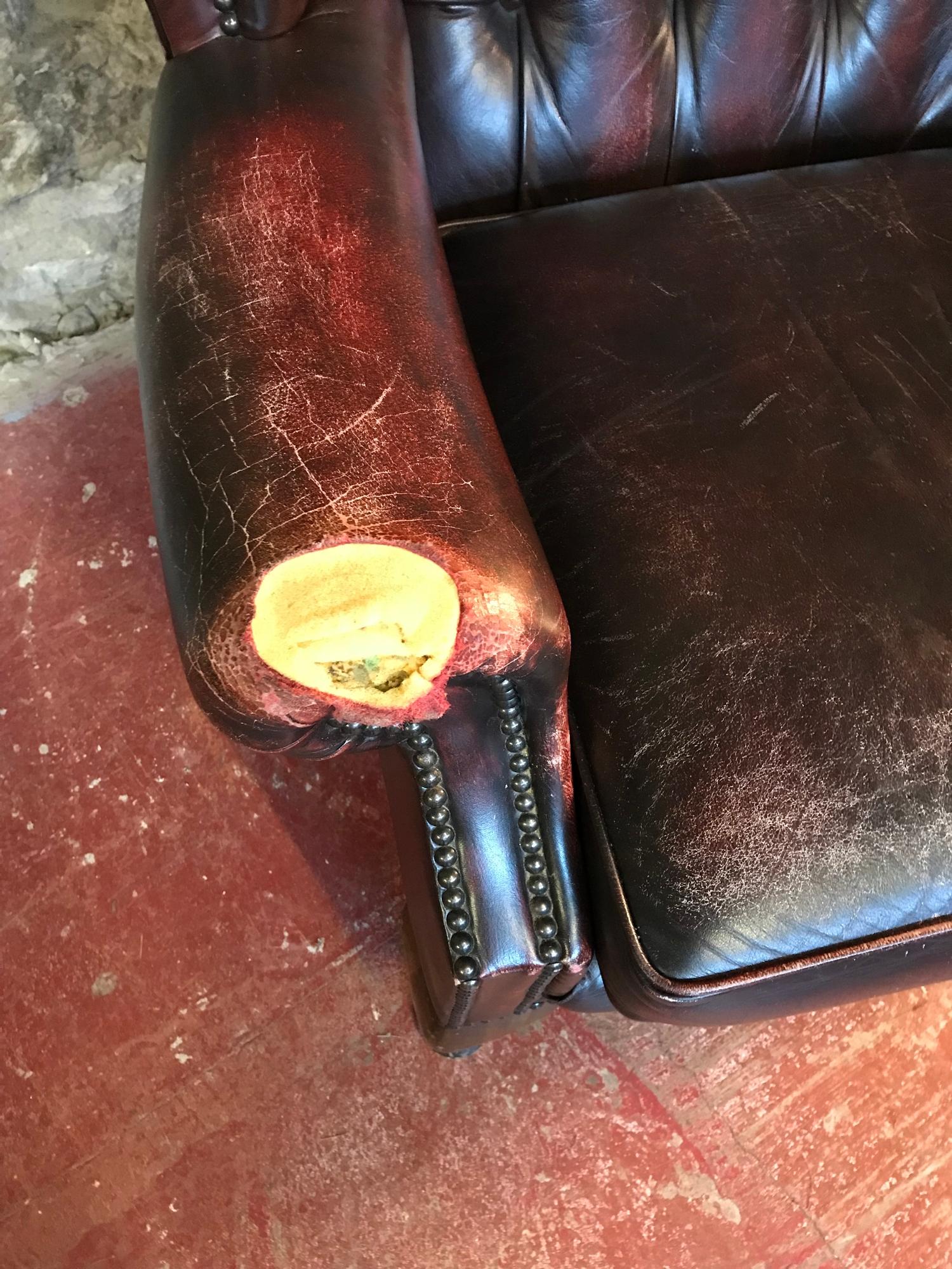 Ox blood red chesterfield gull wing chair.Left arm needs attention. As seen in the photographs - Image 3 of 3