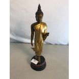 Bronze Thai Buddha figurine on adjoining stand, 30cm in height