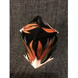 Moorcroft lidded pot signed to the base. 16cm in height