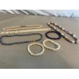 A collection of fresh water pearl necklaces & bracelets