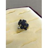 9ct Gold ladies ring, set with 7 Sapphires & 2 diamonds.