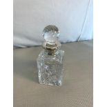 Birmingham Silver collard and cut crystal decanter. measures 16cm in height. Maker Laurence R Watson