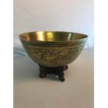 Bronze Chinese Phoenix & Dragon design bowl on hardwood stand. Signed to the base. 24cm in Diameter