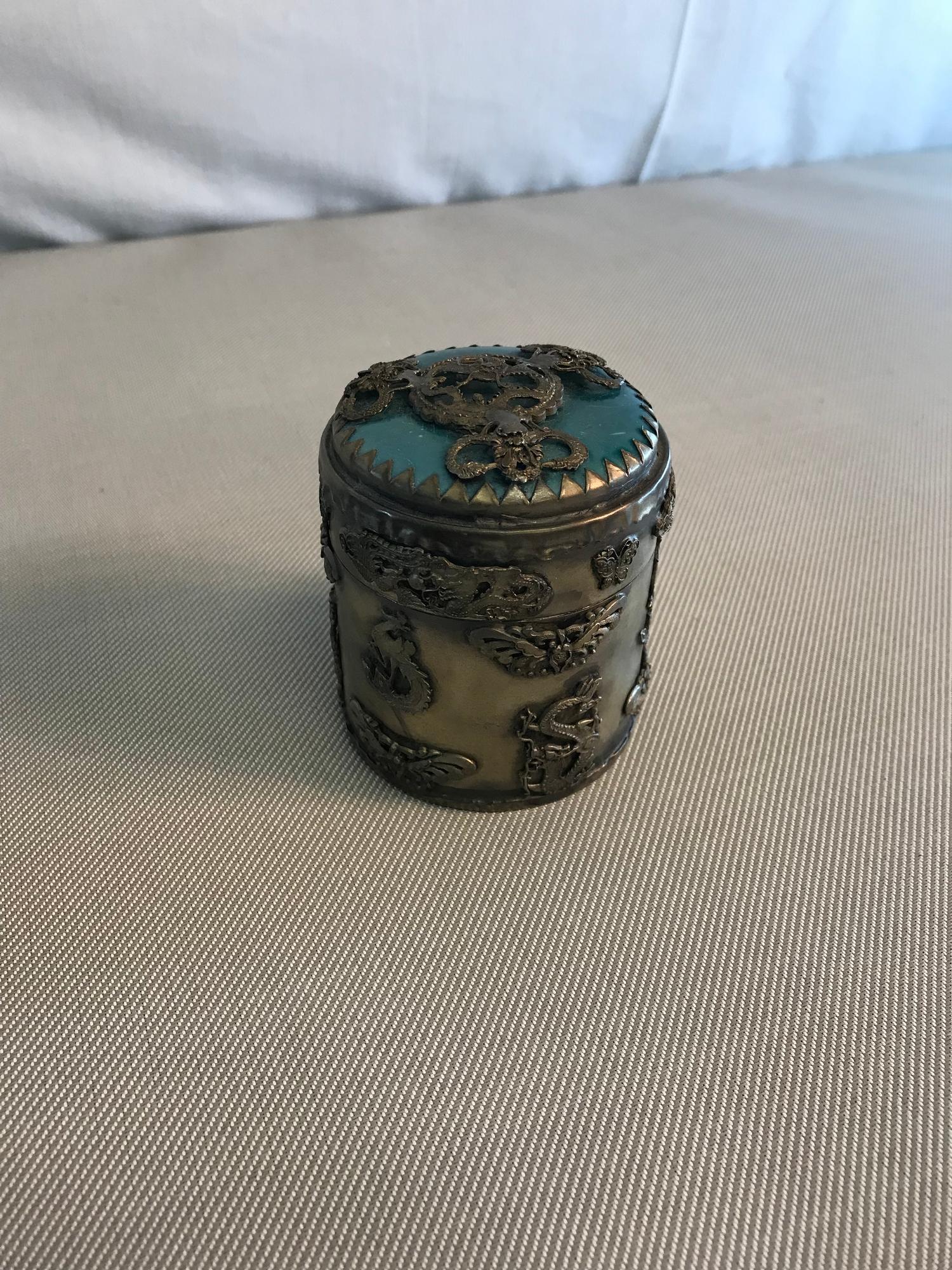 Tibetan White metal storage pot with turquoise stone top. Depicting dragons, phoenix &