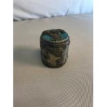 Tibetan White metal storage pot with turquoise stone top. Depicting dragons, phoenix &