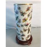 1900's Oriental hand painted butterfly design vase with hard wood stand. Six figure signature to