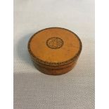 Mauchline ware snuff box with saying to the top of the lid. "He who is not our friend at a pinch
