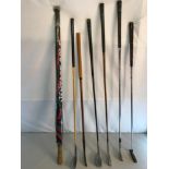 A collection of Vintage golf clubs to include Hickory clubs