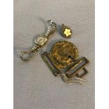 9ct Gold cased ladies watch, together with a yellow metal brooch & belt buckle