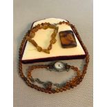 Collection of Amber style bead jewellery to include cameo brooch and watch