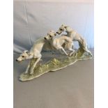 Hutchenreuther Greyhounds or whippets by Hans Achtziger. Measures 20 inches long. 9.5 inches high.