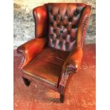 Gullwing button back Chesterfield in oxblood red