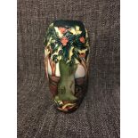 Moorcroft Tree design vase. signed to the base. stands 18.5cm in height.