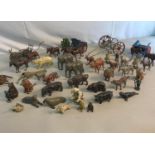 A collection of Lead Britains Ltd Zoo & Farm animals, carriages, wagons etc