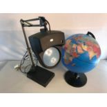 Hobby craft magnifier light working together with desk top globe