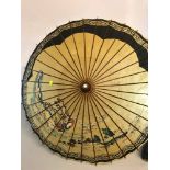 2 Oriental Parasols. One is hand painted with geishas and the other is embroidered with flowers,