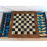 Oriental inlaid and carved chess board with pieces