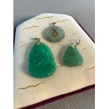 3 Carved jade pendants