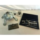 Mixed lot to include mathematical set, desk blotter, inkwell pot & cast metal frog garden sprayer