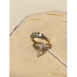 14ct gold ladies ring set with 3 large square diamonds.