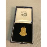 9ct gold Greenock Academy Sports Champion medal presented to Alex Gray dated 1938. 3cm in height