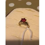 Heavy 9ct gold ring set with a large Pink cut stone possibly pink sapphire or Pink Tourmaline