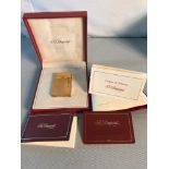 S.T.Dupont Paris gold plated lighter with certificate, Booklets and case.
