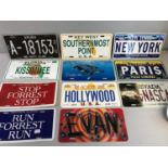 A Collection of souvenir bumper plates. Includes RUN FOREST RUN, NEW YORK & PARIS.