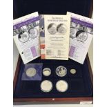 4 Silver mint coins, 3 with certificates, 2006 5 pound coin & 1930 silver Indian head Five cents