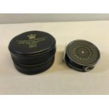 Hardy Bros. "The Perfect 3 3/8" fly reel, Has wet cel fast sink fly line and also comes with pouch.