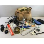 A Collection of fishing gear which includes fishing bag, Spinning reels, Fishing lures & Minnows