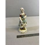 Volkstedt Dresden hand painted lady figure holding and reading letters.