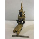 Heavy bronze praying Thai Buddha figurine. Stands 31cm in height.