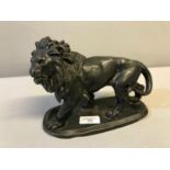 19th century Spelter lion signed Coinchon. Measures 16x23x9cm