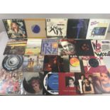 A Large selection of 45 rpm's. Artists such as Phil Collins (Genisis) Queen, The Who, The