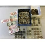 A collection of mixed world coins & banknotes