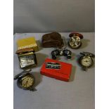 Collection of vintage travel clocks which includes 2 Dalvey Voyager clocks, Pocket binoculars & Echo