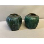 2 Early 1800's green glazed oriental pots no lids. Stamped to the base. Measure 15.5cm in height