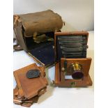 Antique Mahogany and brass fitment bellow camera with 3 slide plates and original carry case. (Carry