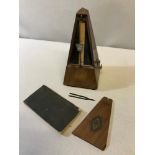 A small lot to include; Antique French Maelzel Paquet 1846 metronome, 1858 Scottish Psalmody sheet