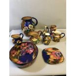 A Collection of H & K Tunstall hand painted flower design jugs, bowl and vases