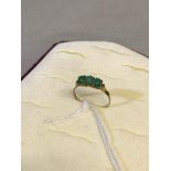 Sheffield 9ct gold ladies dress ring set with 3 jade stones. Weighs 1.84grams