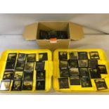 A collection of antique slides, together with an additional box of antique slides