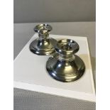 A Pair of Birmingham silver dwarf candle sticks. Weighted