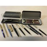 A Collection of Parker pens and others which includes 14kt gold nib parker fountain pen